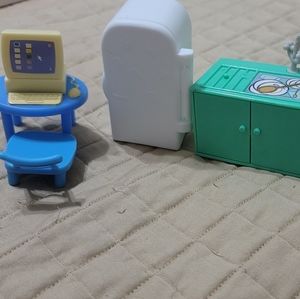 Peppa Pig refrigerator, stove, sink and computer.
